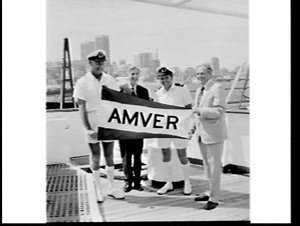 P. & O. Line ship Cathay receiving AMVER pennant, Pyrmo...