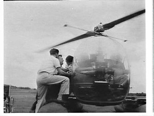 Children with polio having a helicopter ride, Bankstown...