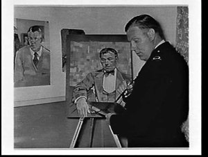 Naval officer painting a portrait for the Olympic paint...