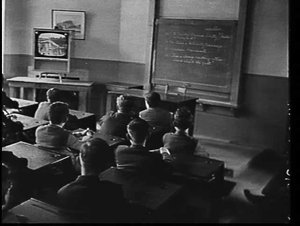 Schoolboys watching a television broadcast at Sydney Bo...