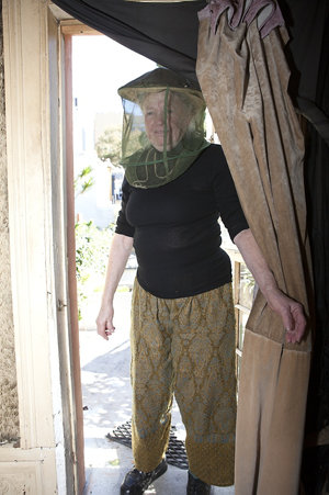Item 52: [Portrait of Charis Schwarz with beekeeper's h...