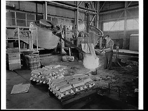 Casting parts at the forge of the RAAF De Havilland Vam...