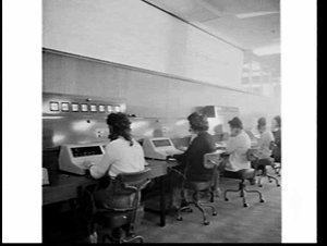 Women data entry staff with computer terminals at TAB H...
