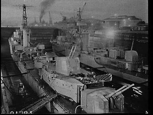 Two Naval ships in dry dock at Garden Island