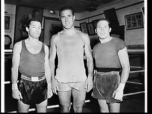 Sergio Milan [boxer] and two boxers at McQuillan's Gym