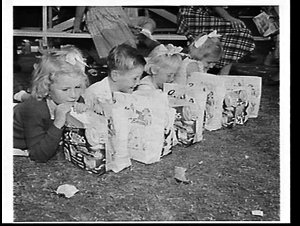 Children with sample show bags at the Royal Easter Show