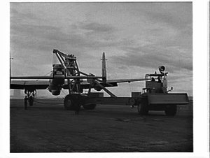 Le Tourneau electric wheel crane lifting an Avro Lincol...