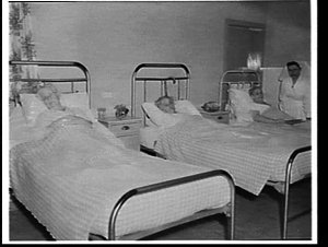 Nursing sister and women in hospital beds at Hammondvil...