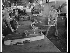 Casting parts at the forge of the RAAF De Havilland Vam...