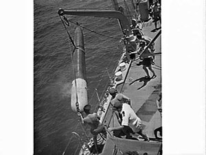 HMAS Parramatta firing and recovering a torpedo at sea