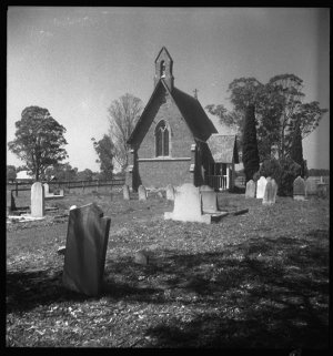 File 07: [Church and graves, ca 1940s] / photographed b...