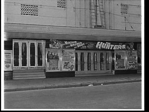 Exterior of Mayfair Theatre advertising the film The hu...