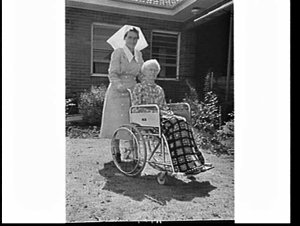 Nursing sister and woman in wheelchair at Hammondville ...