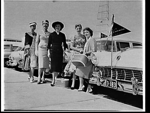 Miss Moorehead, American model, with models and Ford Cu...