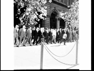 President of the Rural Bank and bank officers lay a wre...