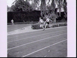 Runners Betty Cuthbert and Marlene Mathews practise baton-changing for the relays, Rome Olympic Games 1960