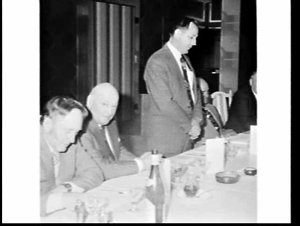 New Chairman R. Oswald addresses lunch or dinner for TA...