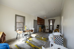 Item 23: The living room of 31 Argent Street, Billy Goa...