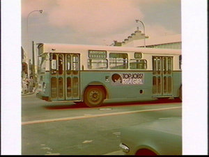 Bus with Alan Davis advertising sign for Rita Girl empl...