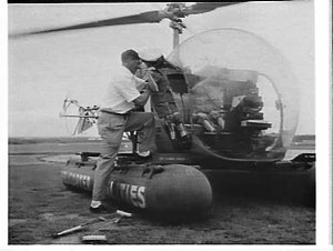 Children with polio having a helicopter ride, Bankstown...