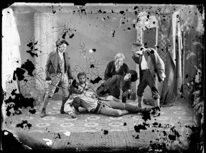 Group of unidentified men pose in a tableau vivant