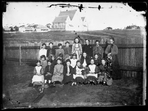 Woman teacher with primary class at the Church of Engla...