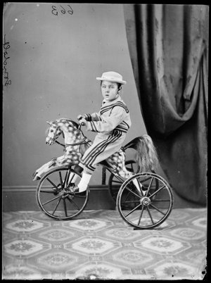 August [Augustus ?] Gondolf on his tricycle