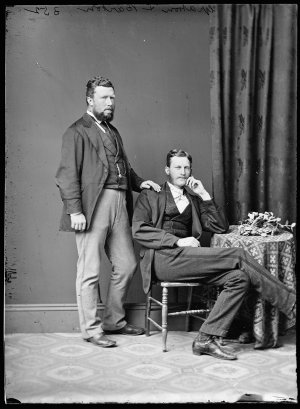 Thomas Gratton, commission agent (standing), and Robert...