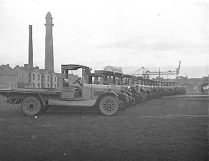 A line up of twenty Dodge and Albion trucks of carrier ...