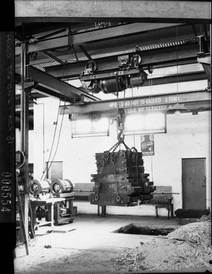 Workshop scene, showing two ton electric hoist, doing a...