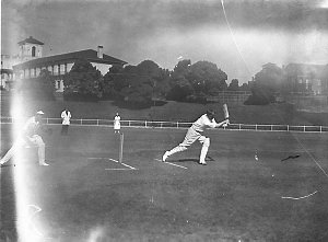 Women cricketers being coached at University Oval