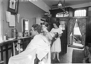 Two of the first female men's barbers, Miss Dolly House...