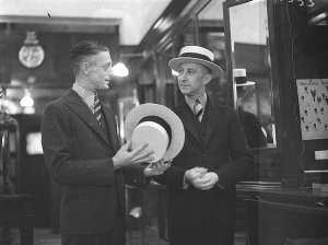 Two men modelling hats in City Hatters, Pitt Street