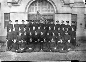 Salvation Army group of fifteen male officers and thirt...