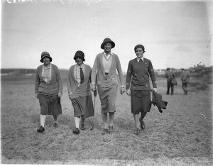 Four women golfers, two on the right are Miss Odette Le...