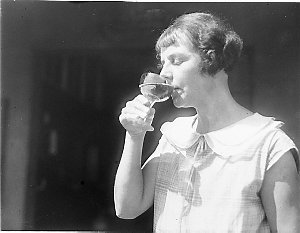 Woman tasting the wine