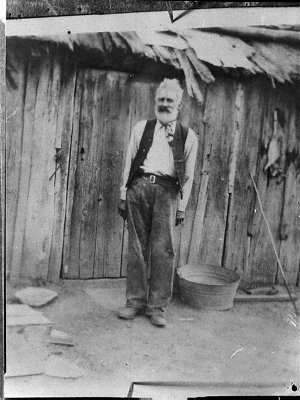 Old man outside slab hut (copy for Mr Dowman)