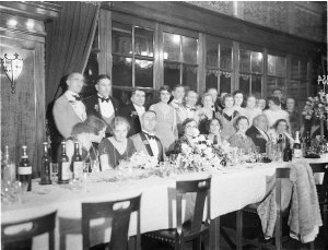 Group of Army officers and women at a table