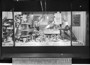 Nock & Kirby's window (M.G.M. "Boom Town")