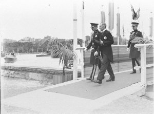 HRH Prince Henry escorted from Man o'War Steps by ?