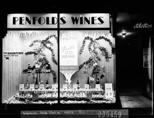 Penfold's Wines display in shop windows of the saloon i...