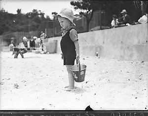 Small boy with his sand-bucket