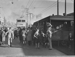 Trolley bus and steam tram carriage at opening of new t...