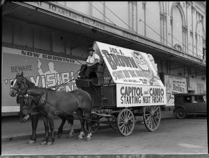 Capitol Theatre advertising on a cart for Joe E. Brown'...