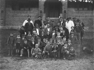 Group of boys in front of Stewart House at Curl Curl [o...