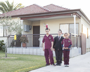 Item 11: Cousins with galah, outside home, Bankstown, N...