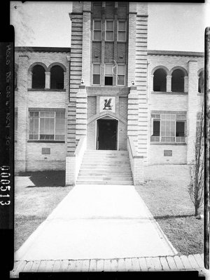 Sectional view of entrance; showing the school crest, N...