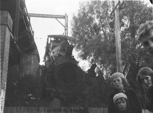 55 class locomotive crash: children look at crashed loc...