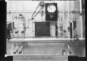 A large control panel of valves and gauges, Empire Timb...