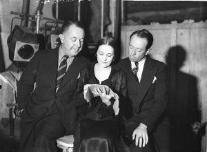 Cecil Kellaway and two actors back stage